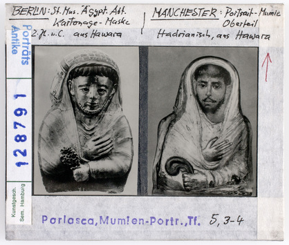 preview Mumienmasken. Kartonagemaske aus Hawara, 2. Jhd., Berlin, Ägypt. Museum (links). Kartonage aus Hawara, Anf. 2. Jhd., Manchester. Diasammlung